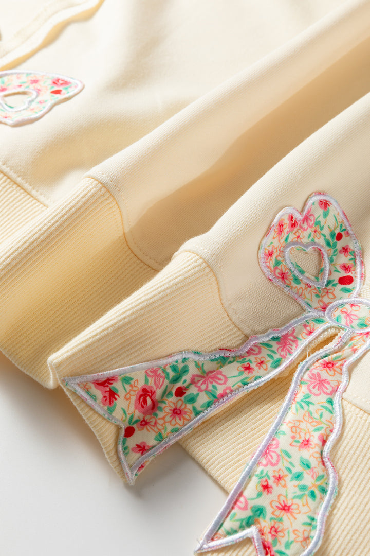 Beige Plus Size Raw Seam Detail Floral Bow Patched Baggy Pullover