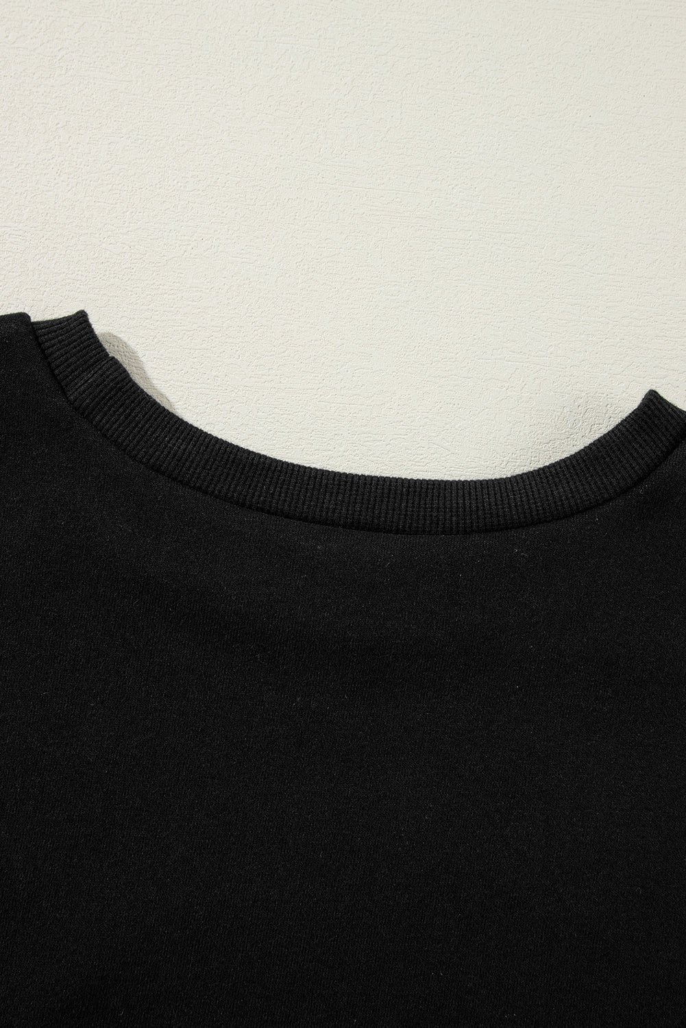 Black Solid O Neck High Low Hem Pullover Sweatshirt