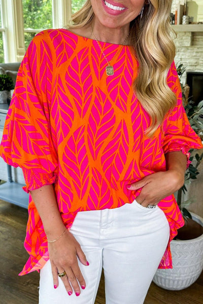 Vibrant tropical leaf print blouse with puff sleeves