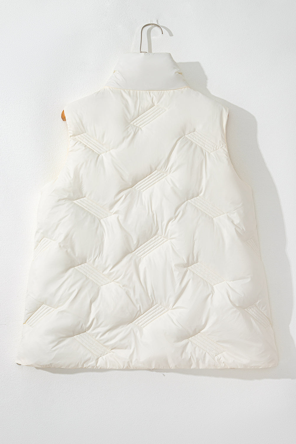 White quilted high neck jacket vest on hanger back