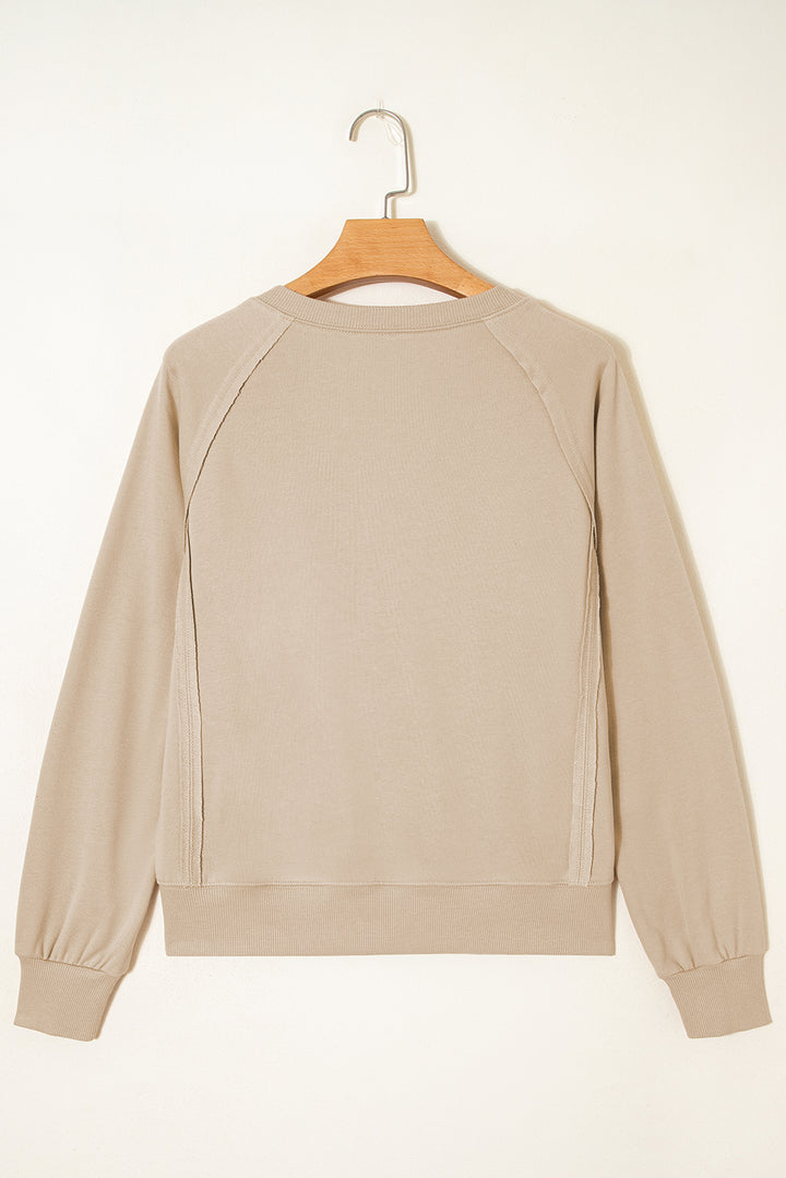 Parchment Raw Edge Exposed Seam Raglan Sleeve Side Slit Sweatshirt