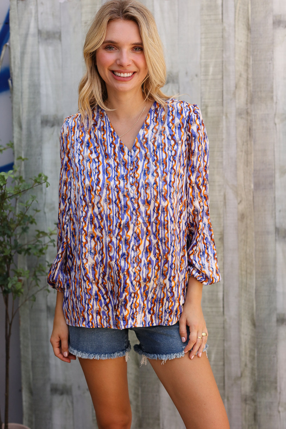 On A Wild Streak V Neck Fabric Button Detail Blouse