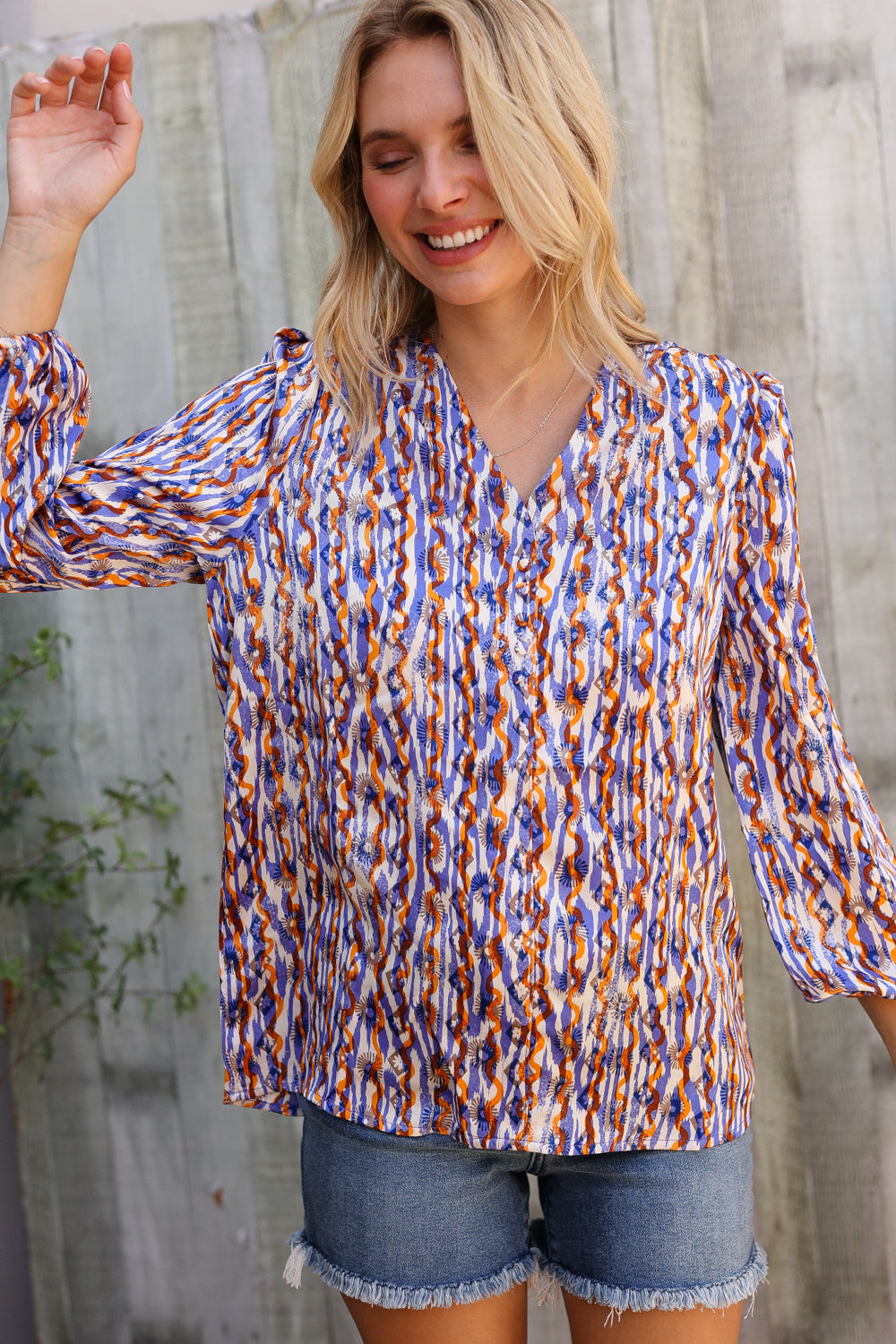 On A Wild Streak V Neck Fabric Button Detail Blouse