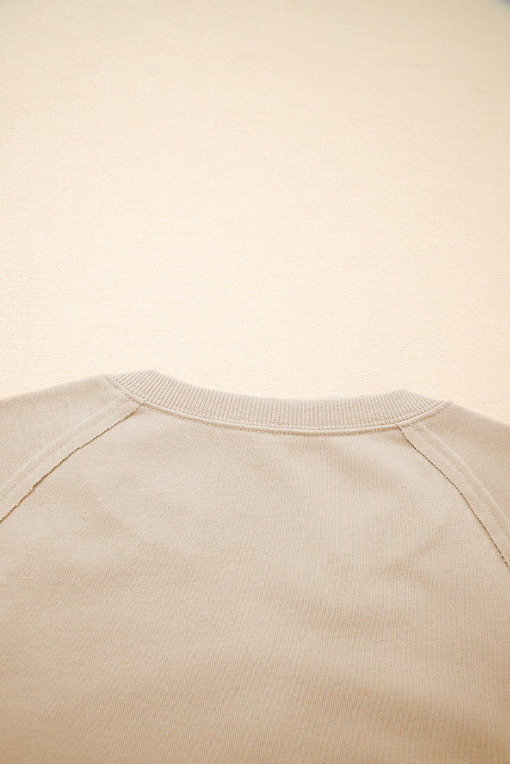 Parchment Raw Edge Exposed Seam Raglan Sleeve Side Slit Sweatshirt