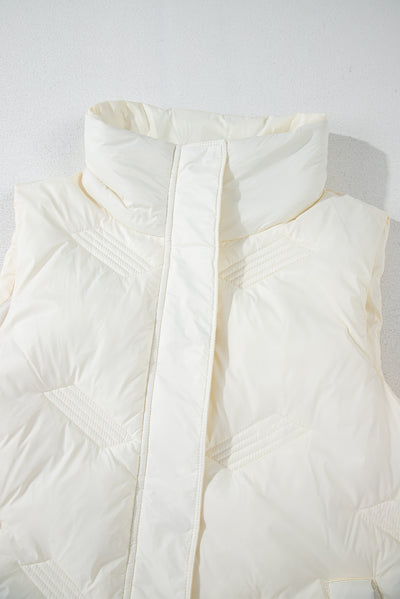 Close-up of white quilted high neck jacket vest