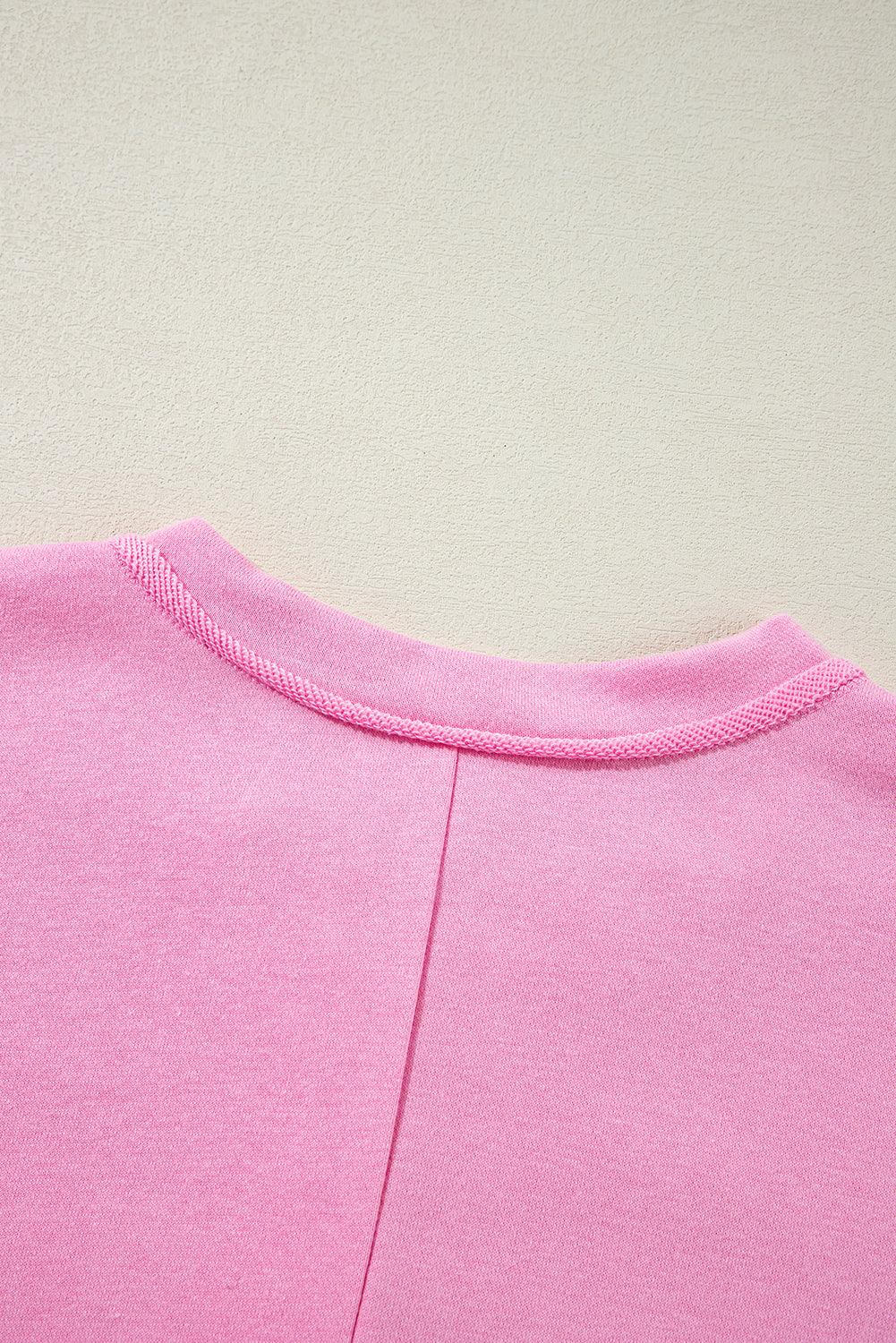 Back neckline detail of sachet pink sweatshirt