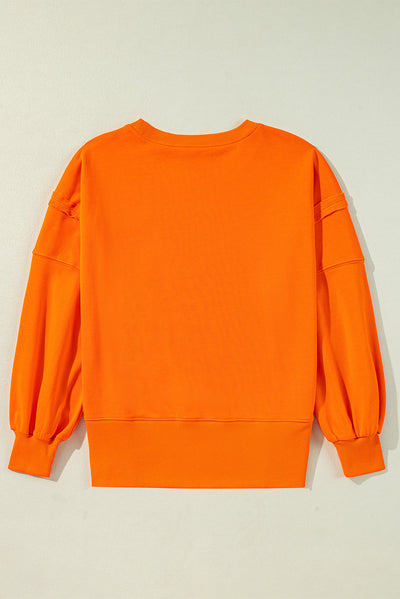 Carrot Exposed Seam Drop Shoulder Round Neck Sweatshirt with Slits