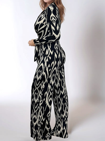 Full Size Leopard Tie Waist Long Sleeve Jumpsuit Plus Size