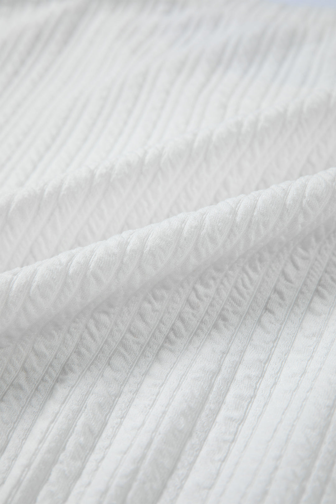 White Solid Color Textured Drop Shoulder Long Sleeve Peplum Top