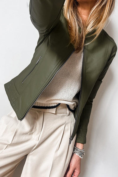 Sage green slim fit bomber jacket paired with beige trousers