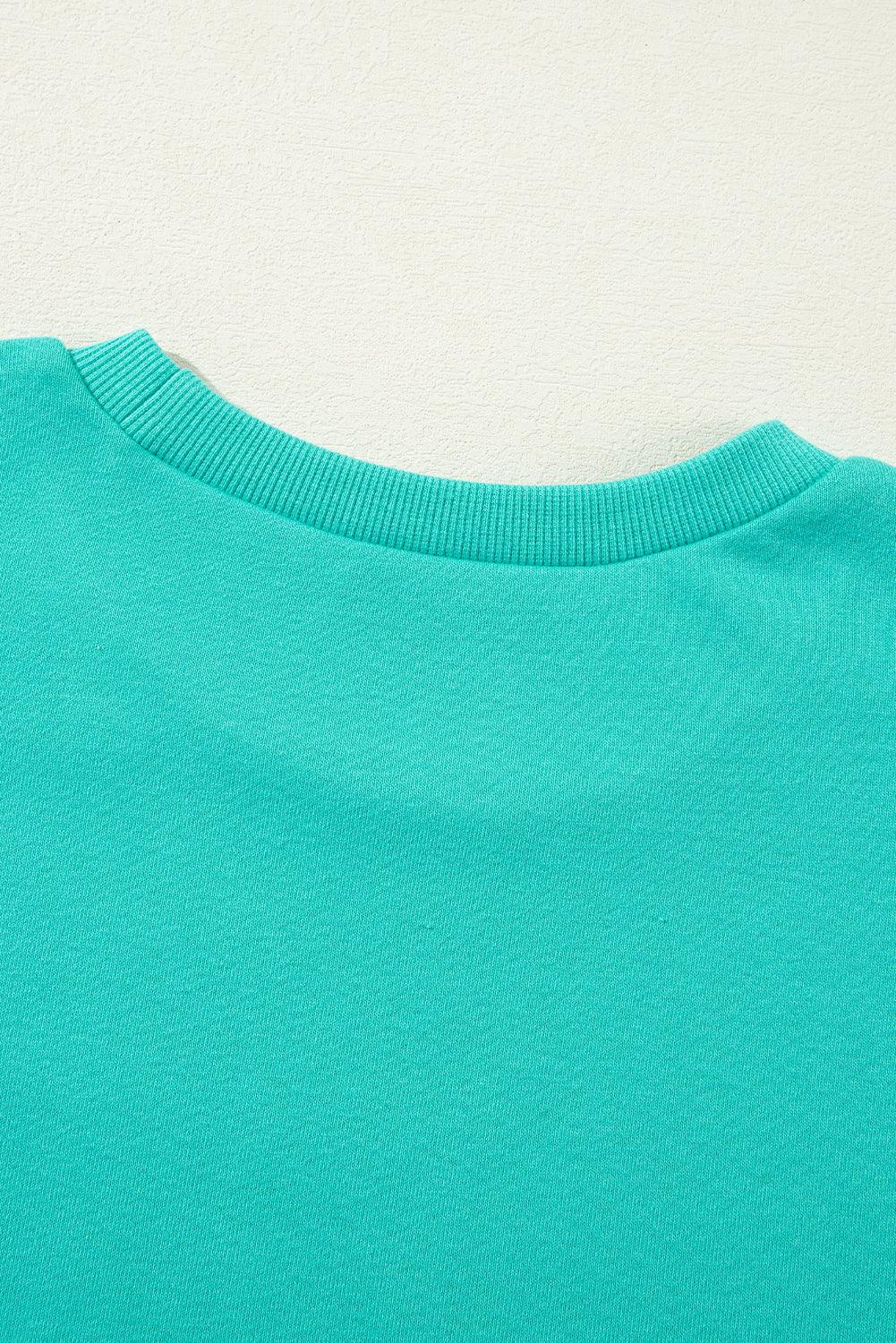 Aruba Blue Solid O Neck High Low Hem Pullover Sweatshirt