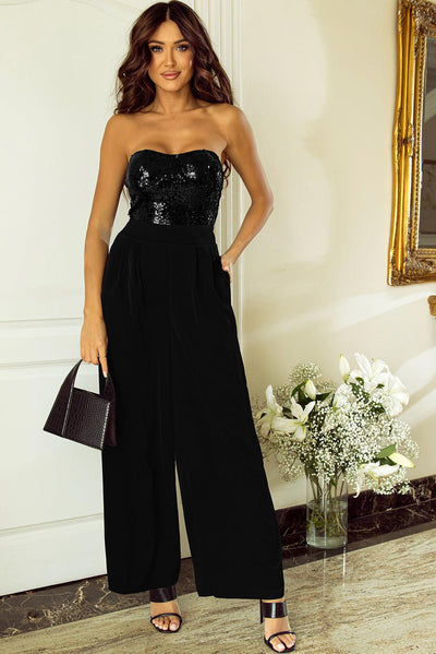 Model wearing black sequin tube top wide leg jumpsuit