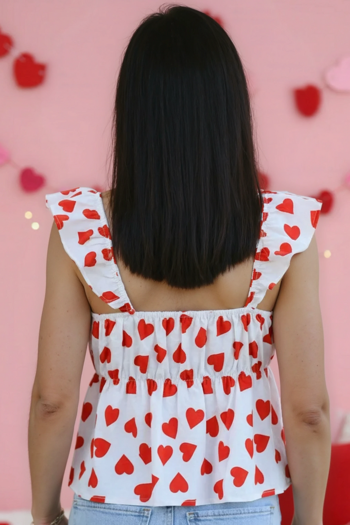 All over heart bow v-neck top