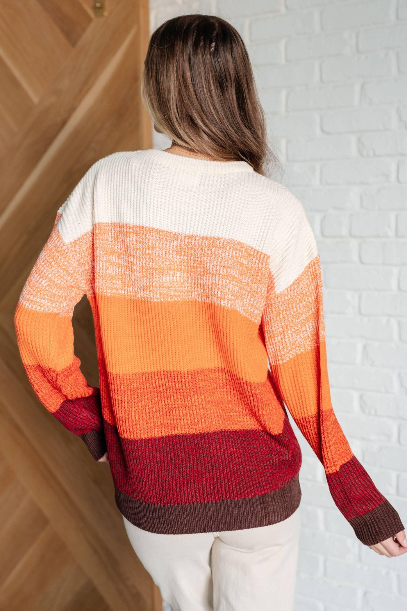 Back of All Too Well color block sweater, warm tones.