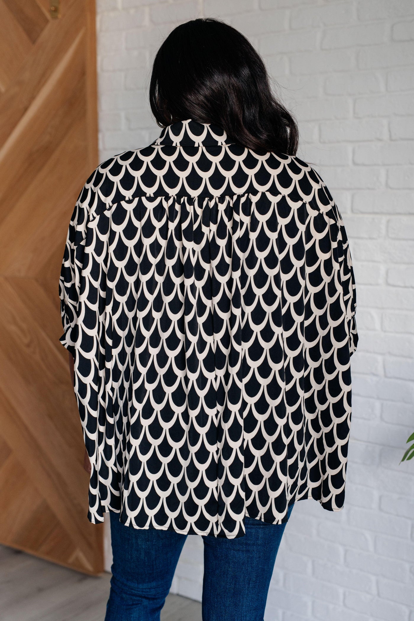 Back view of Art Deco button-up blouse with detailed design