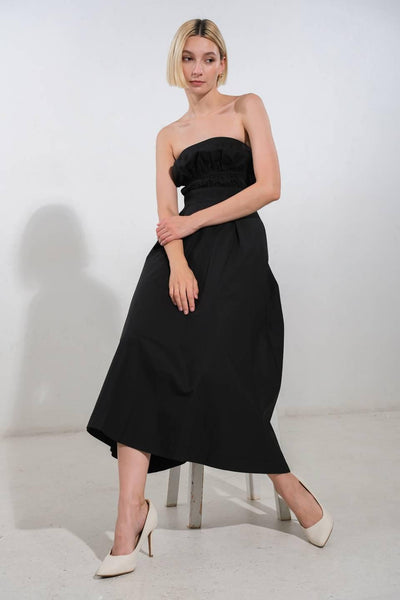 Black strapless woven midi dress seated pose