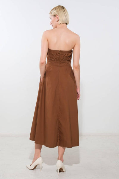 Back view of brown strapless woven midi dress