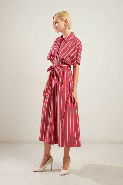 Side view of red striped woven midi dress with waist tie