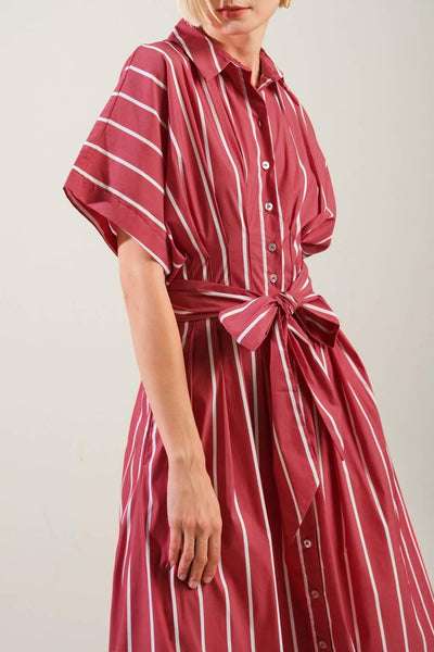 Close-up of red striped woven midi dress with waist tie