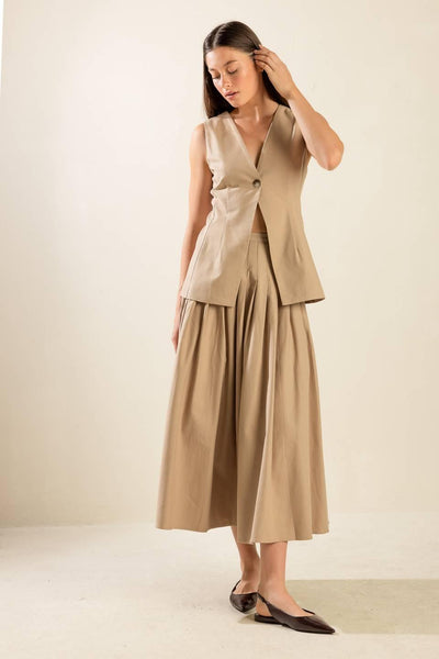 Beige woven vest with flowing skirt