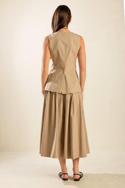 Back view of beige woven vest and skirt