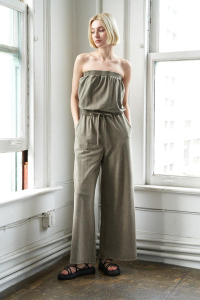 Olive knit jumpsuit with strapless design, front view