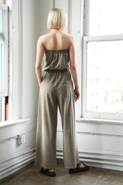 Olive knit jumpsuit with strapless design, back view