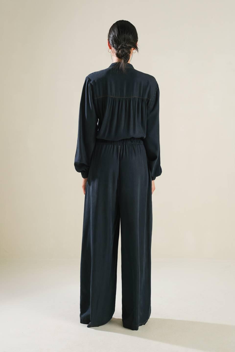 Back view of navy Horizon Haven woven jumpsuit