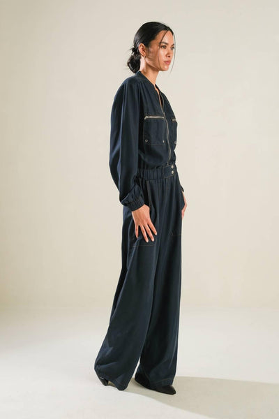 Side view of navy Horizon Haven woven jumpsuit