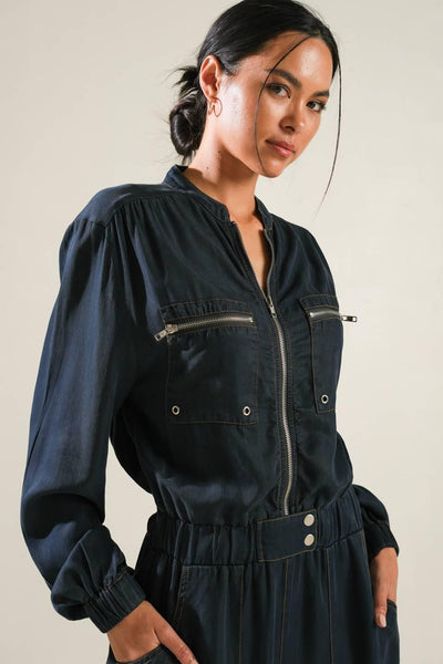 Close-up of navy Horizon Haven woven jumpsuit details