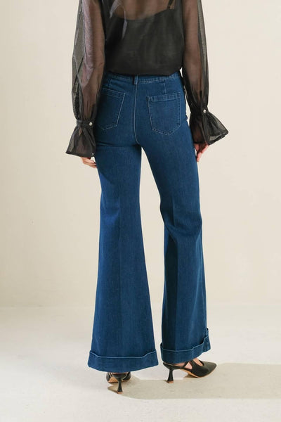 Back view of medium indigo denim pants