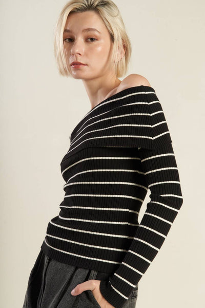 Side view of black and white striped off-shoulder sweater top