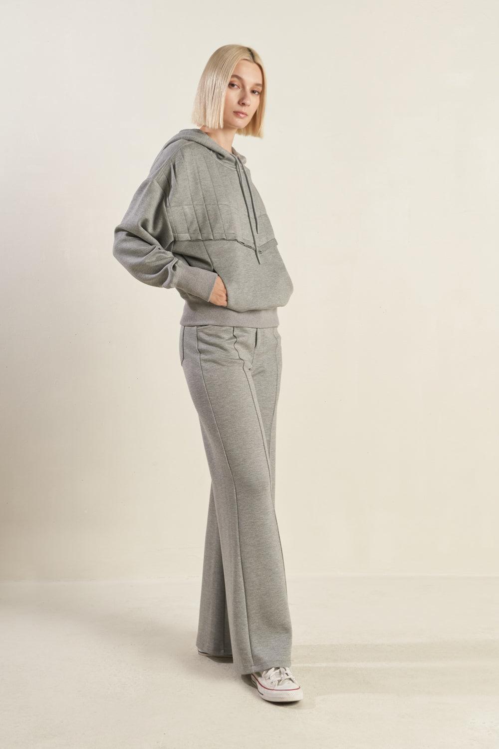 Side view of H.GREY pullover sweatshirt and pants