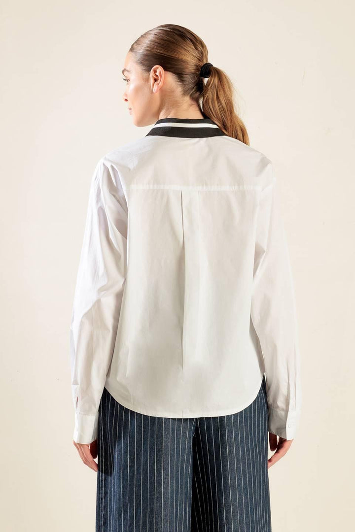 CAUSE A COMMOTION WOVEN TOP