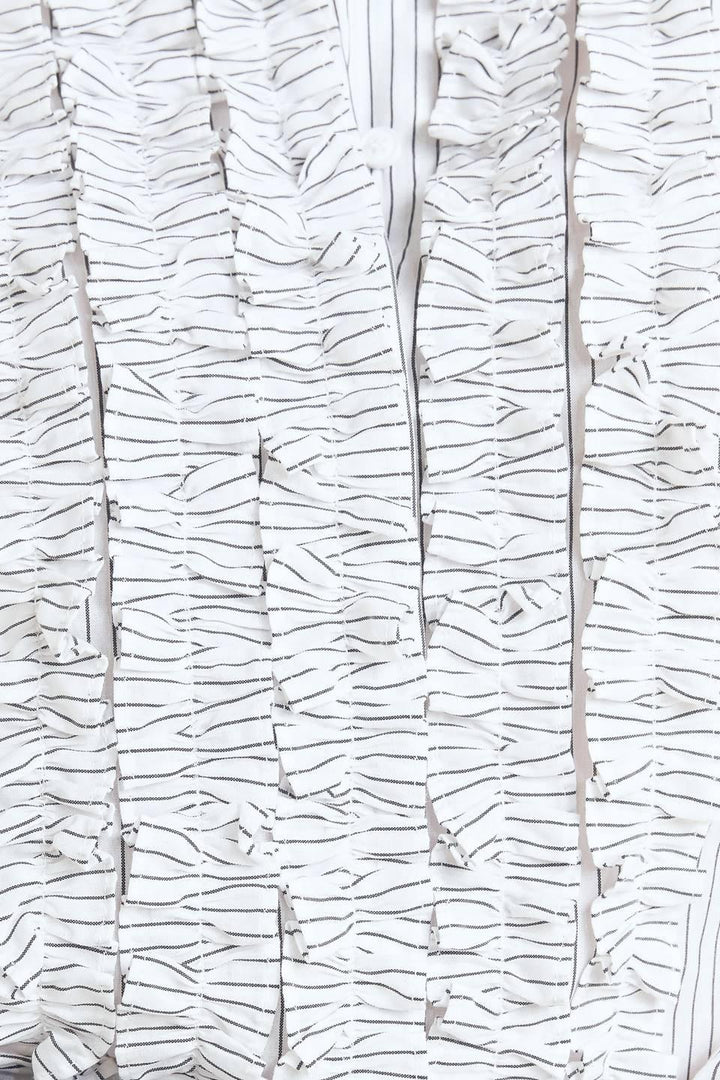 DAYLIGHT EDGE WOVEN TOP