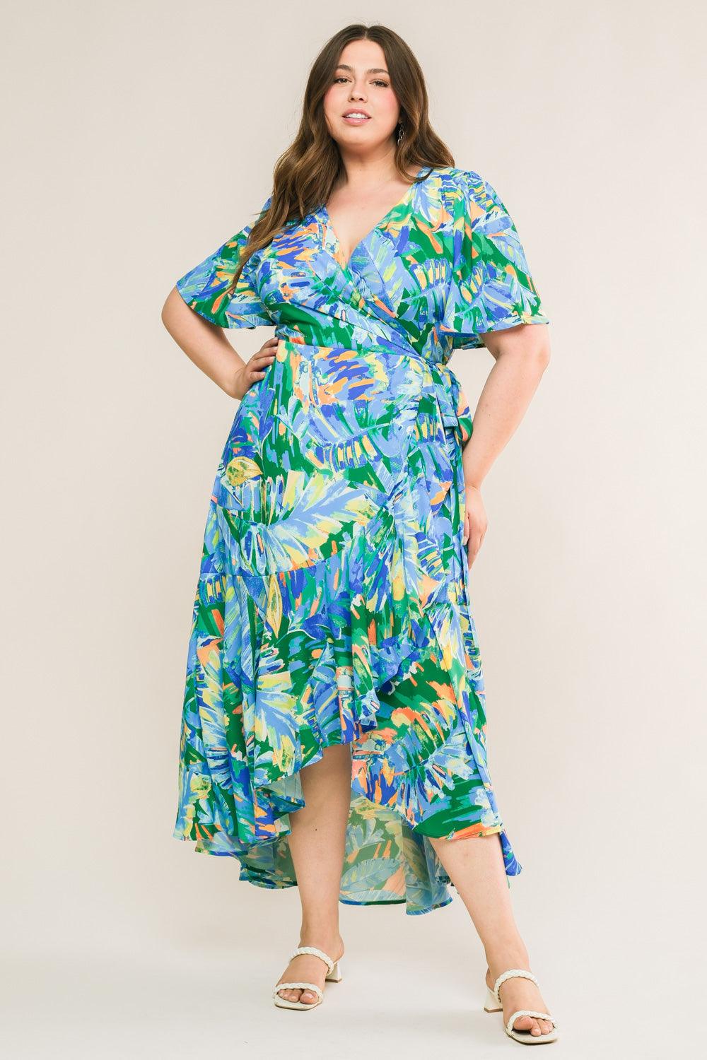 Plus-size model in abstract print woven hi-lo dress