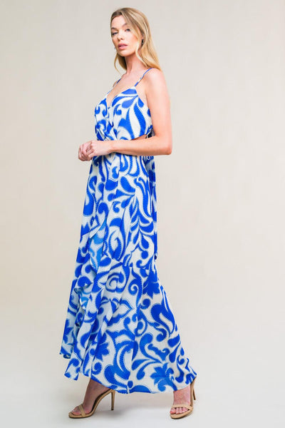 Side view of ivory blue woven midi dress with abstract pattern