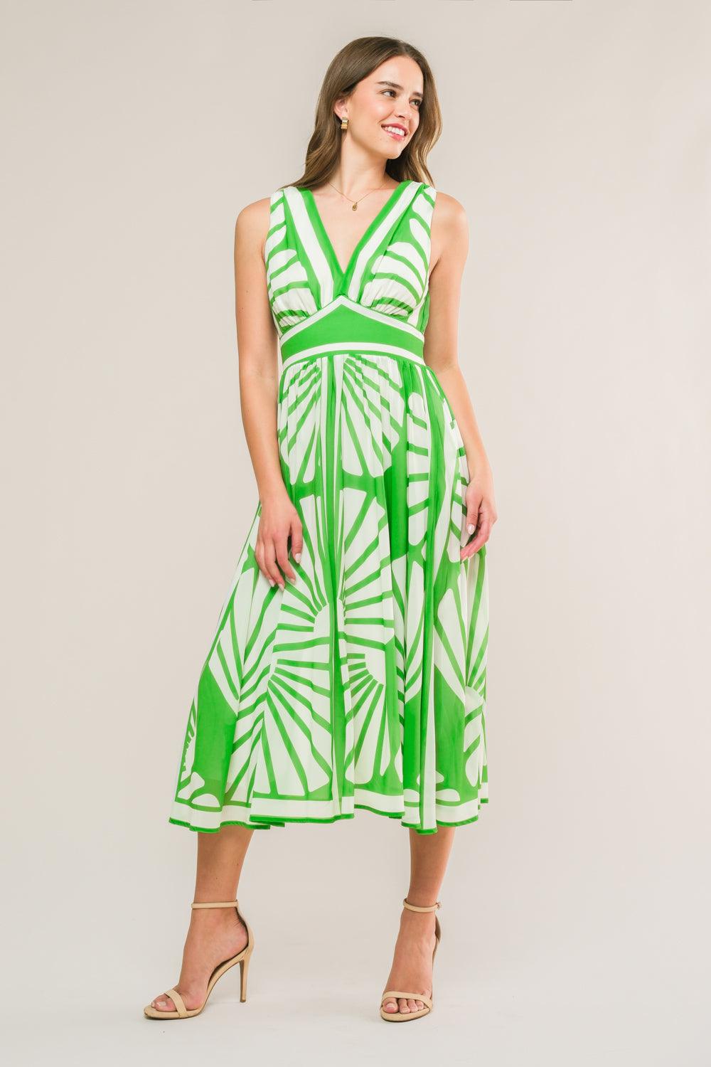 Green woven midi dress with striking white patterns