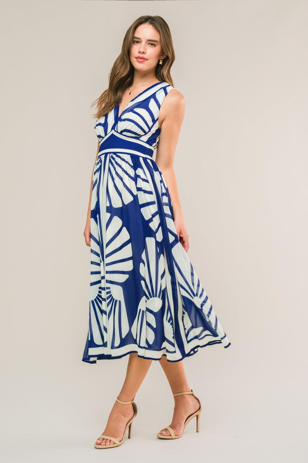 Navy woven midi dress with white patterns, side view