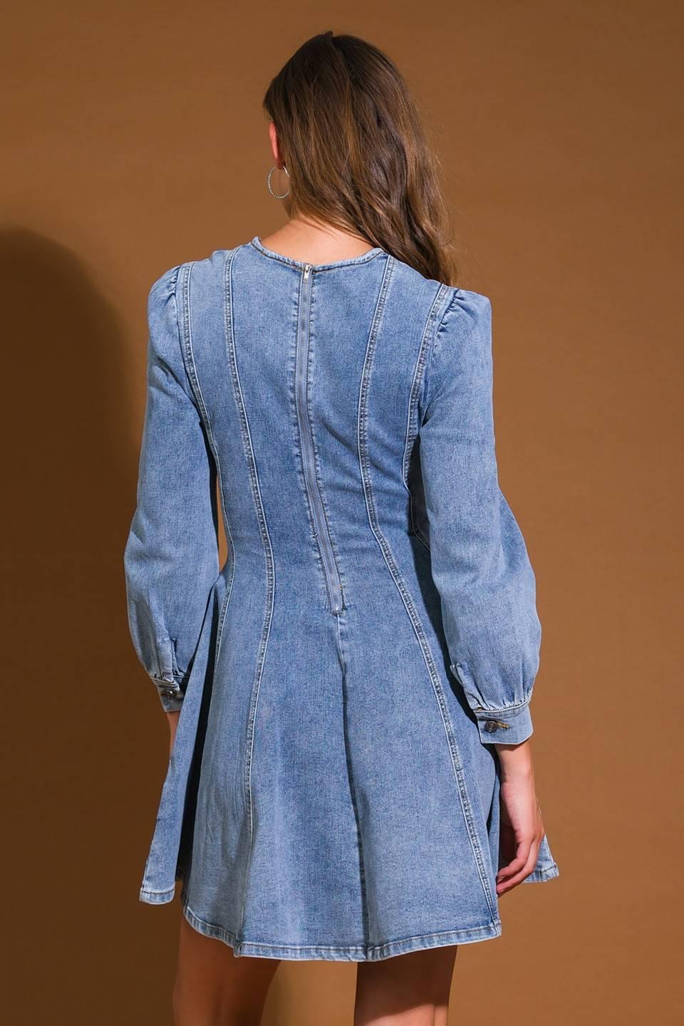 Back detail of blue acid wash denim mini dress