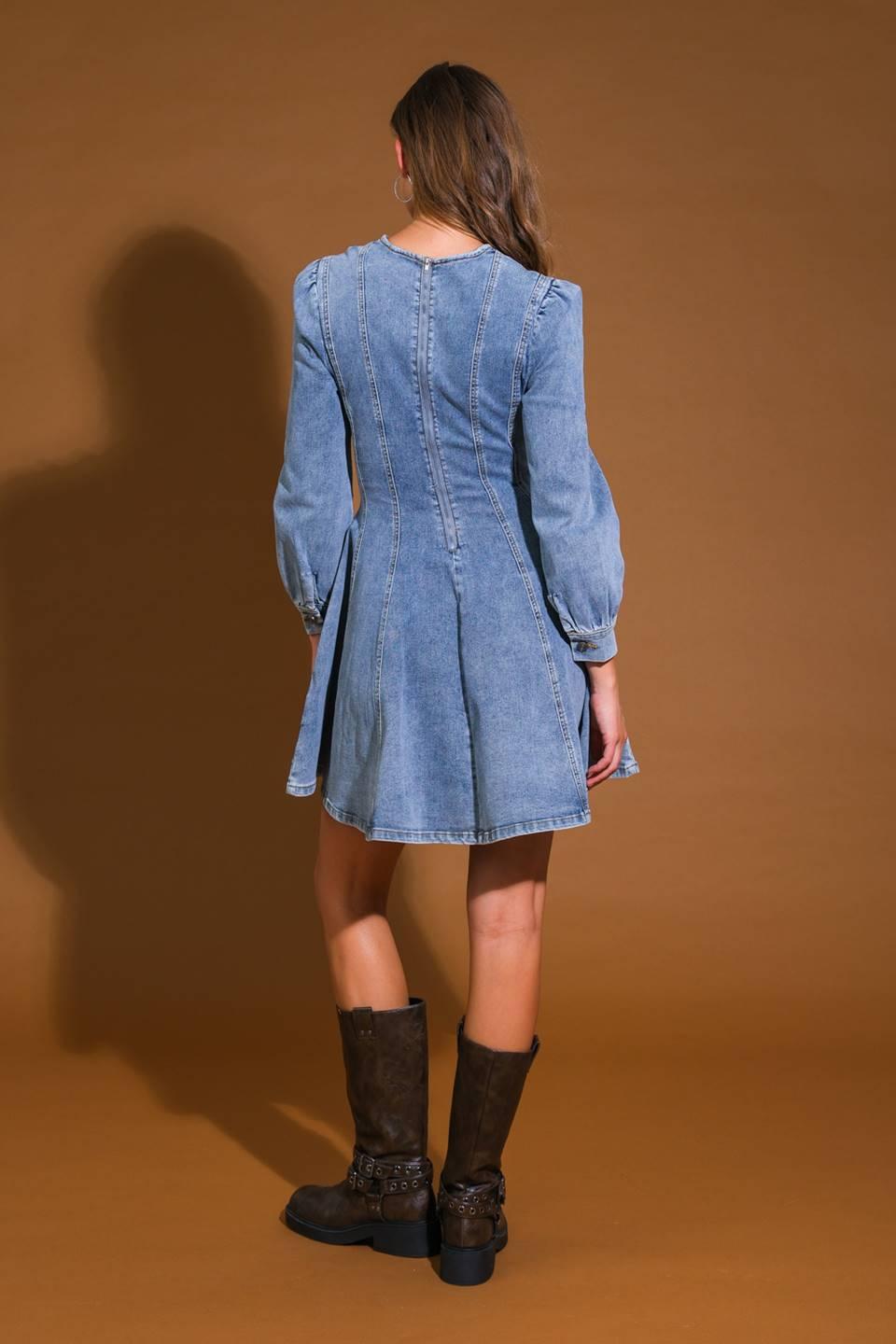 Back view of blue acid wash denim mini dress