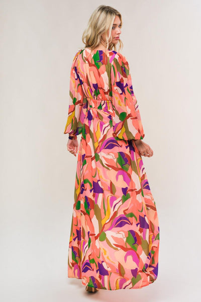 Back view of peach woven maxi dress with vibrant patterns