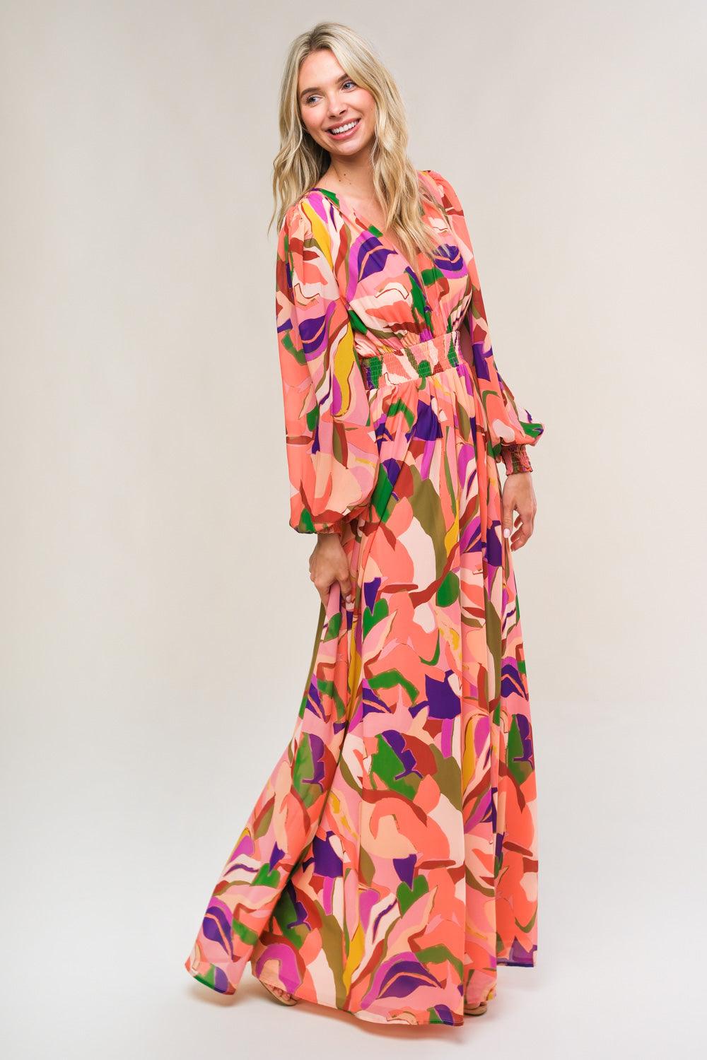 Flowing peach maxi dress with bold abstract design