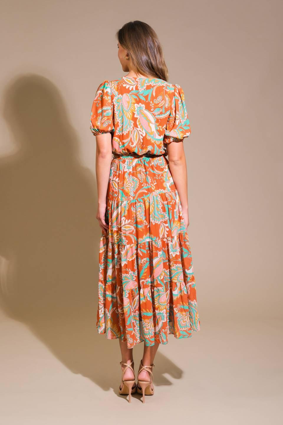 Rust woven midi dress, back view of floral design