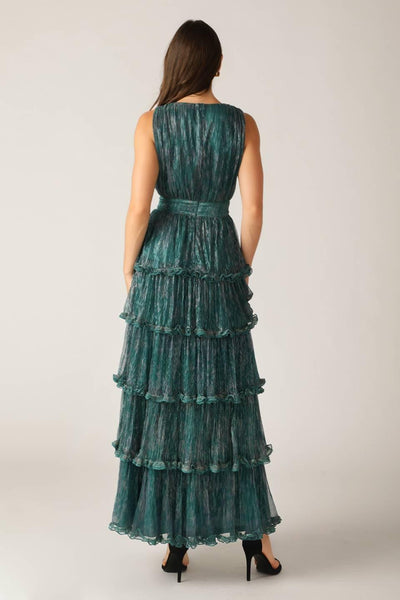 Back view of teal green pleated maxi dress with tiered ruffles.