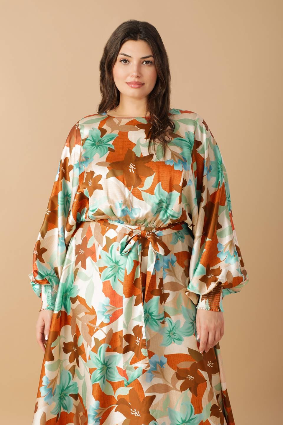 Plus size model in Mystic Twilight Woven Midi Dress, floral design