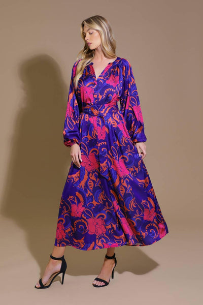 Navy and coral woven midi dress with long sleeves, side view.