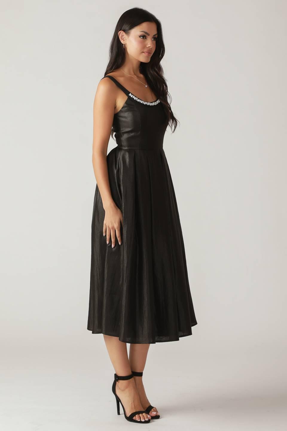 Side view of black woven midi dress with embellished neckline