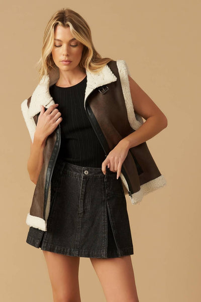 Brown leather vest with shearling trim, front view