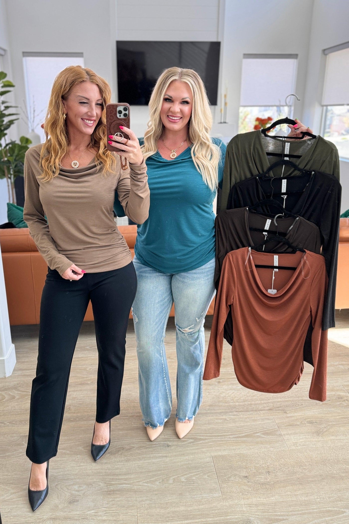 Models showcasing mocha and teal ruched cowl neck tops.